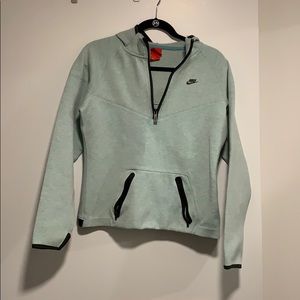 Light blue Nike half-zip pullover, size M